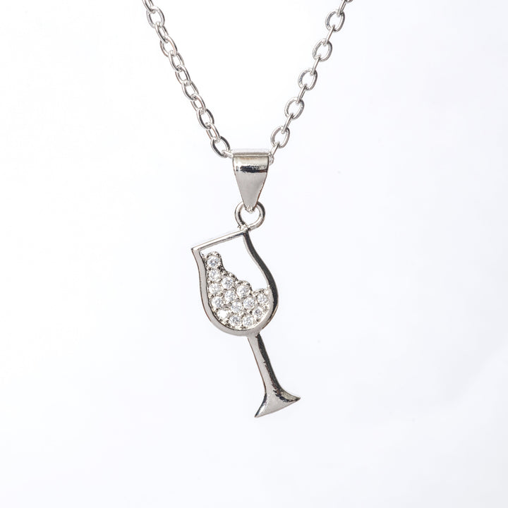 A close up view of bartender necklace in silver colour 