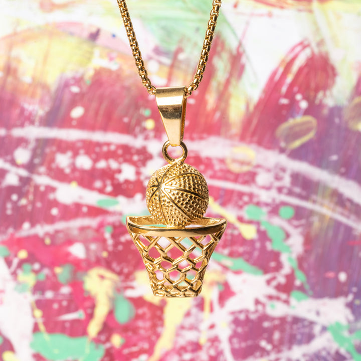 The basketball player necklace standing in front of colorful background in the center of the image, made of red, green and yellow colour. 