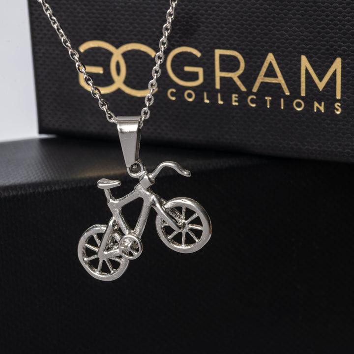 The Biker Necklace standing on the left side of the image against its uniquely designed black box. 