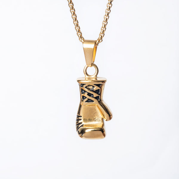 A close up vie of The Boxer Necklace standing in the center of the image against a white background. 