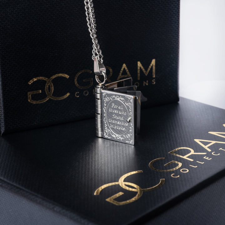 Educational necklace placed on its uniquely designed black boxes. 