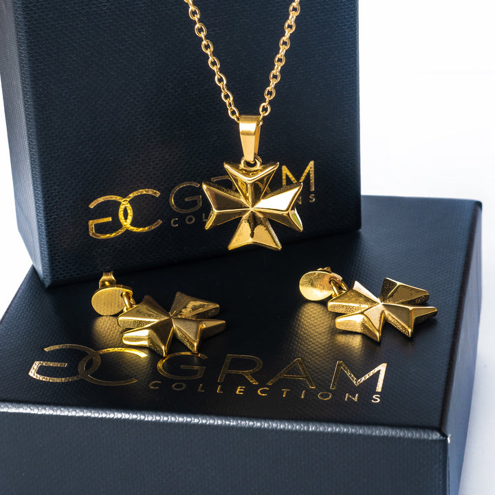 The Eight Pointed Cross Earrings placed on its box. 