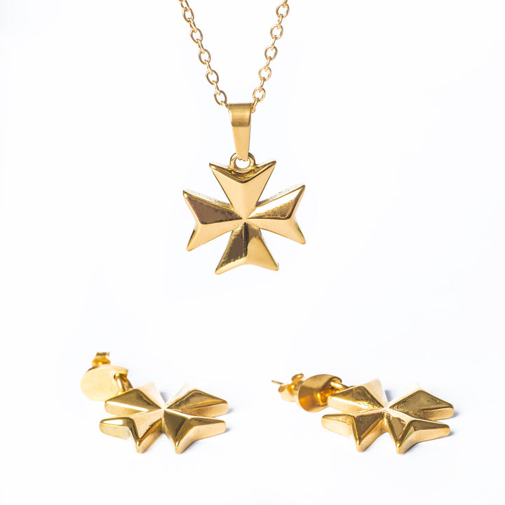 A close up view of The Eight Pointed Cross Necklace standing in the center of the image against a white background. 