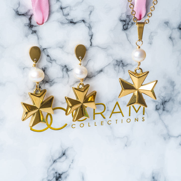 The Eight Pointed Pearl Cross Earrings of gram collections attached on its box, standing in the center of the image. 