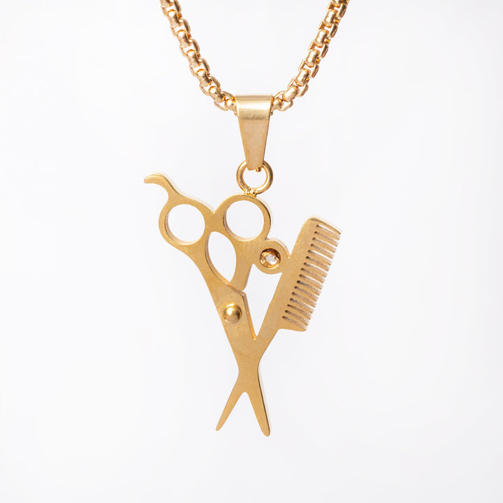 A close up view of The Hairdresser Necklace standing against a white background. 