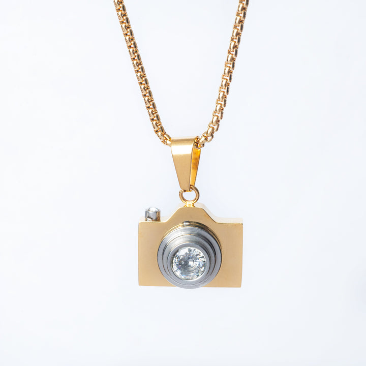 The photographer necklace standing in the center of the image against a white background. 