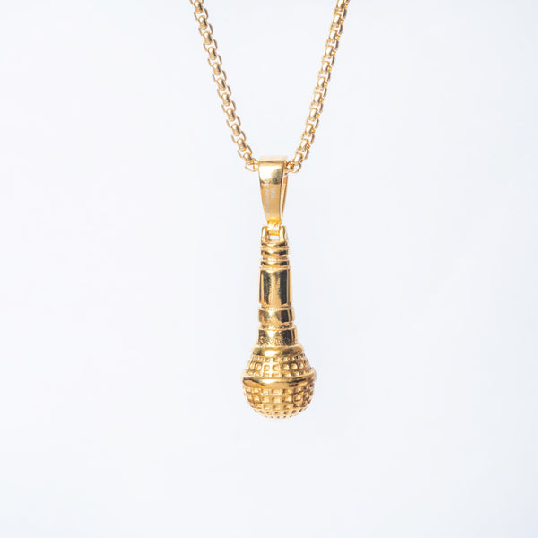 A gold-plated stainless steel necklace with a pendant and chain, displayed against a white background.