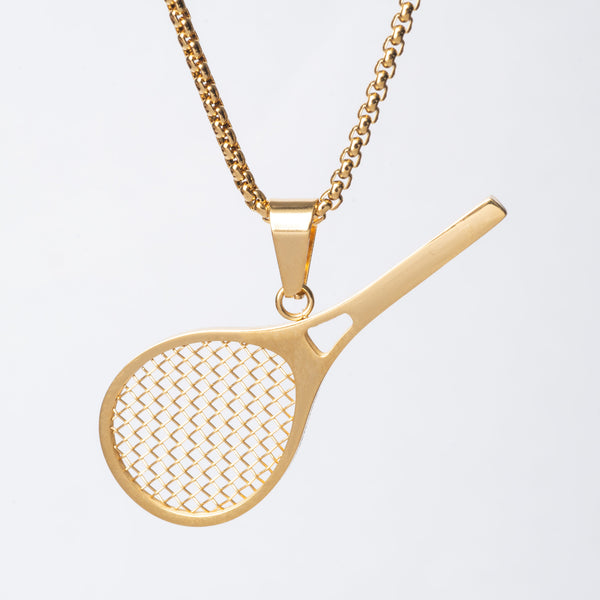 A gold-colored tennis racket-shaped pendant necklace on a chain.
