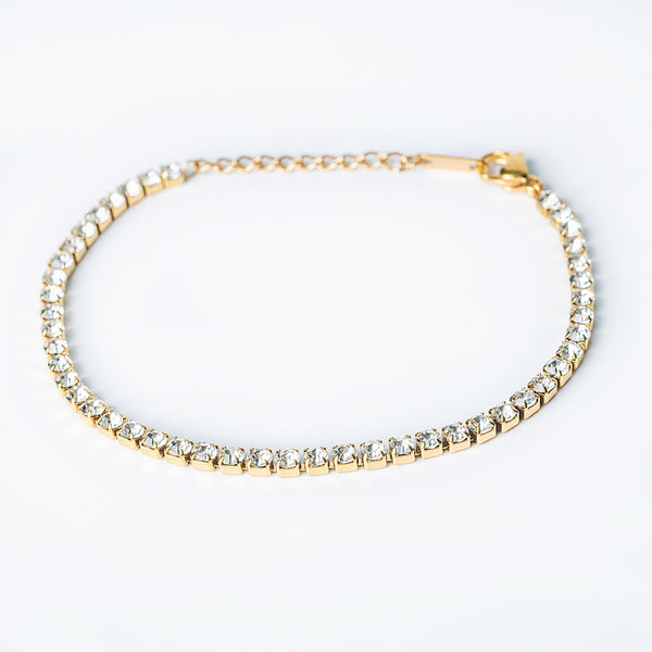 Gold Vegas tennis bracelet with clear round stones