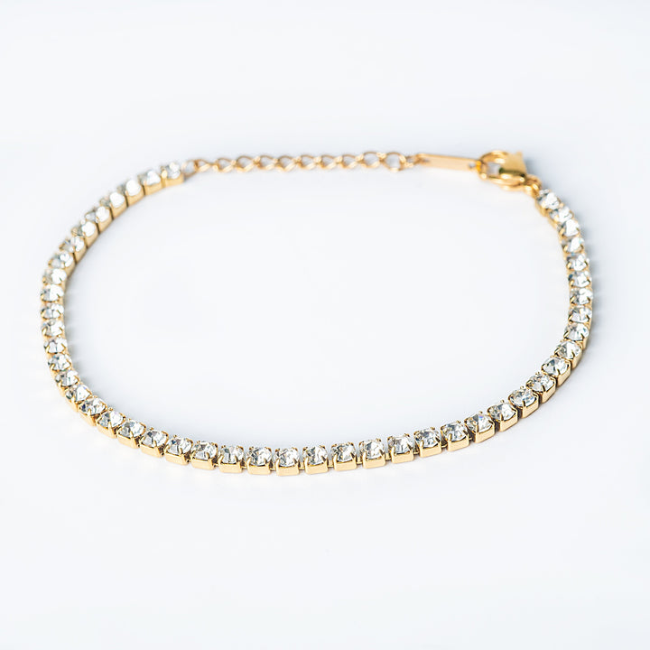 Gold Vegas tennis bracelet with clear round stones
