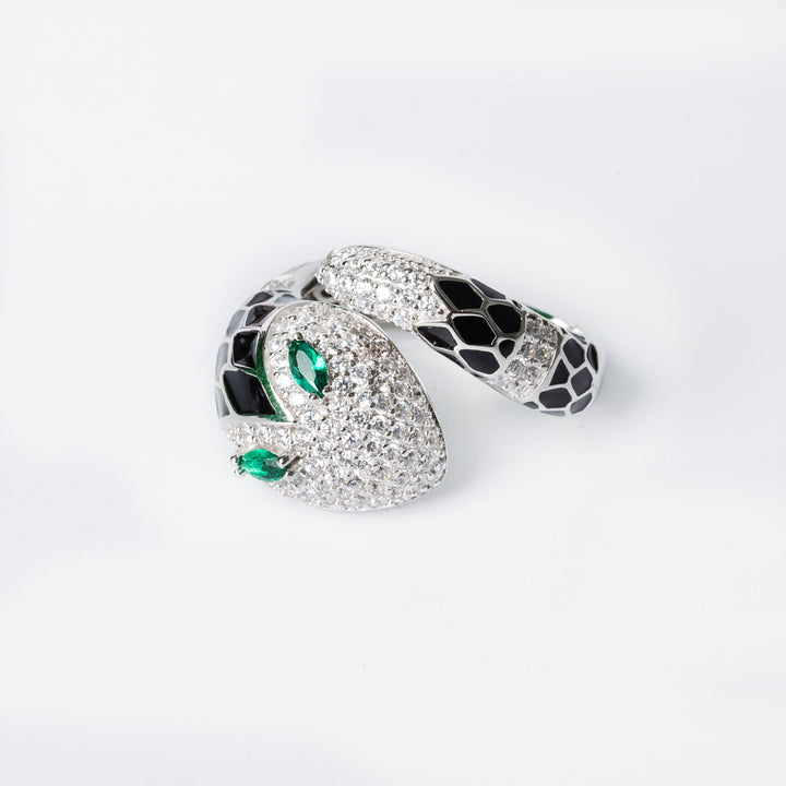 A bird view of Velma Ring, standing against a white background. 
