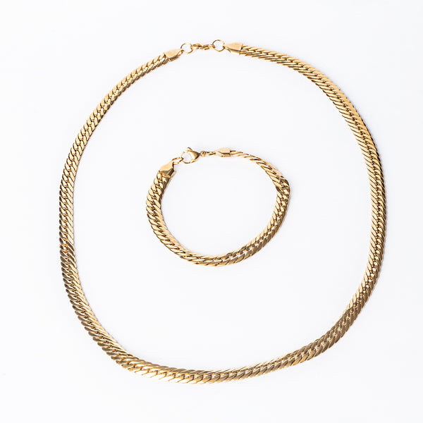 A yellow gold stainless steel Verona necklace with a braided design, displayed against a white background.