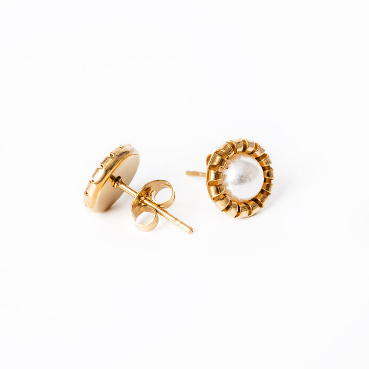 a close up view of Victoria Gold Earrings standing in the center of the image against a white background. 