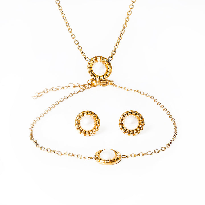 A Victoria Gold Earrings standing in the center of the image against a white background. 