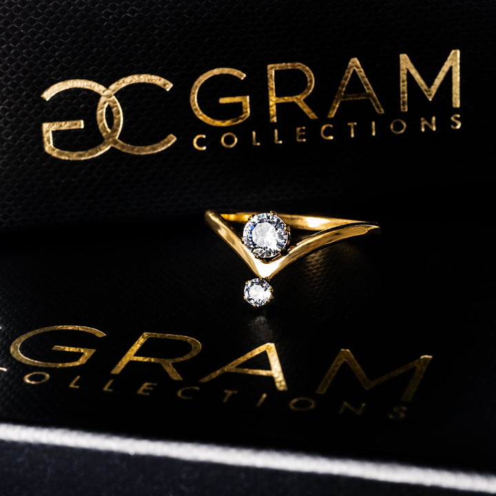 Vincianne Gold Ring placed on its uniquely designed black box of gram collections. 