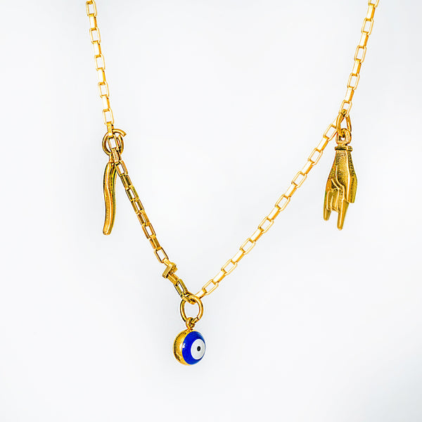 Xorti necklace with charms on a white background