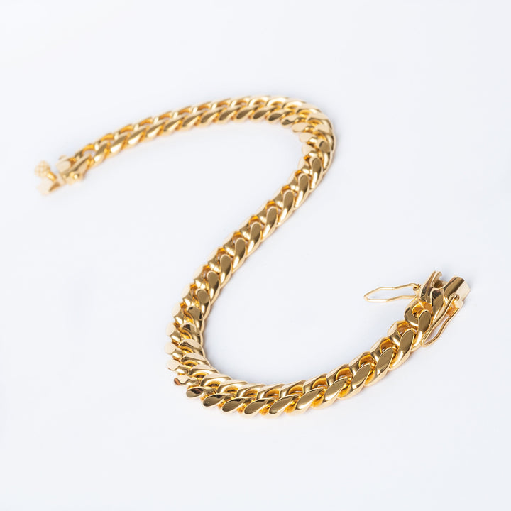 Gold chain Burno bracelet on a white background