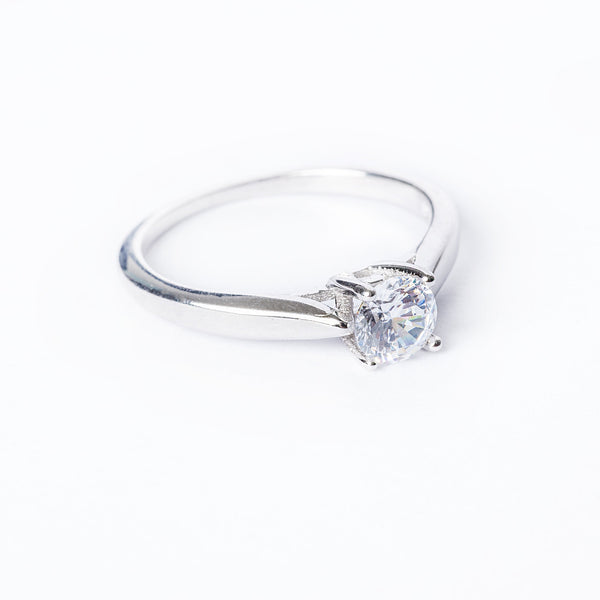 A silver 925 solitaire ring with a single AAA cubic zirconia gemstone on a white background.
