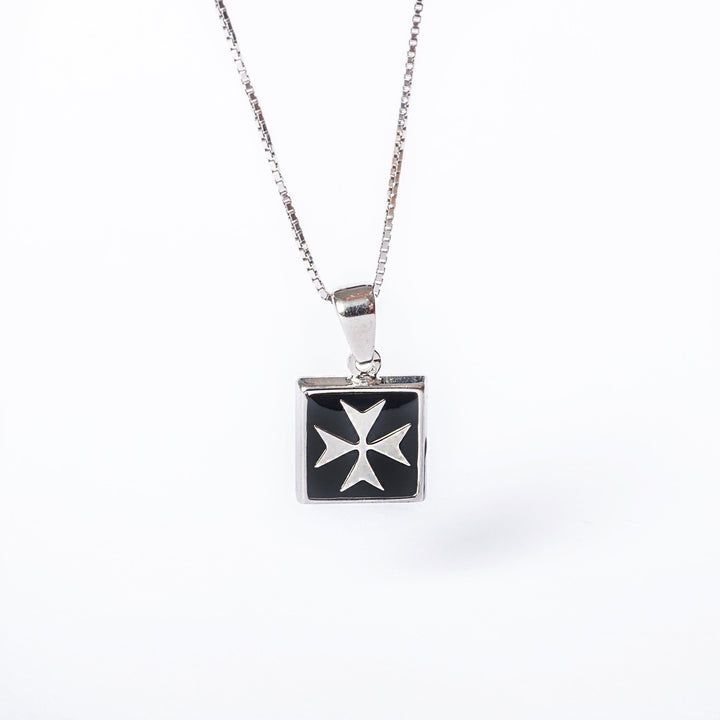 A close up view of Gianni Silver pendant standing in the center of the image against a white background. 