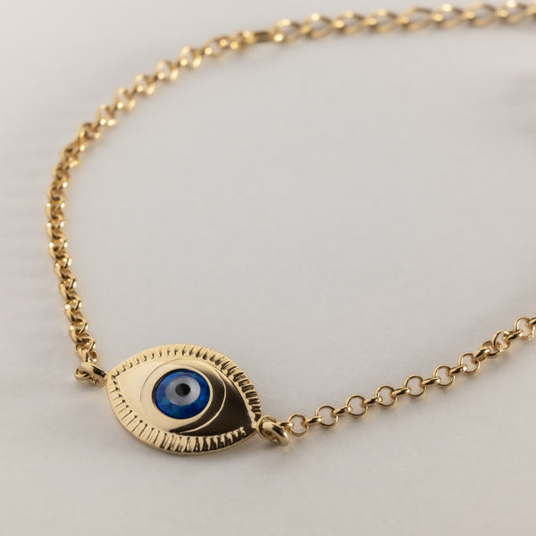 A gold-plated sterling silver Evil eye bracelet with a hypoallergenic finish, featuring an eye-shaped charm.