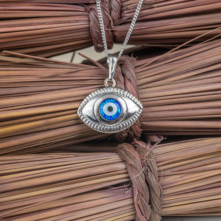 A close up view of Evil Eye Silver Charm Pendant