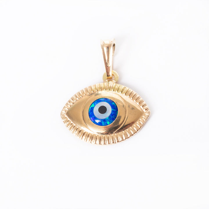 Bird view of Eye Of The Osiris Pendant standing in the center of the image against a white background. 