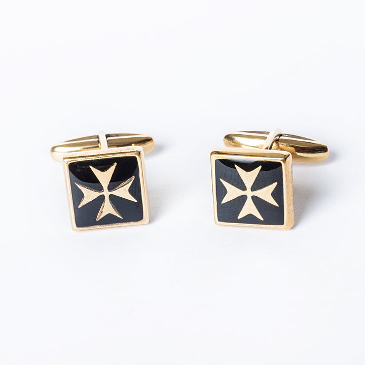 A front view of Gianni Gold cufflinks standing in the center of the image against a white background. 