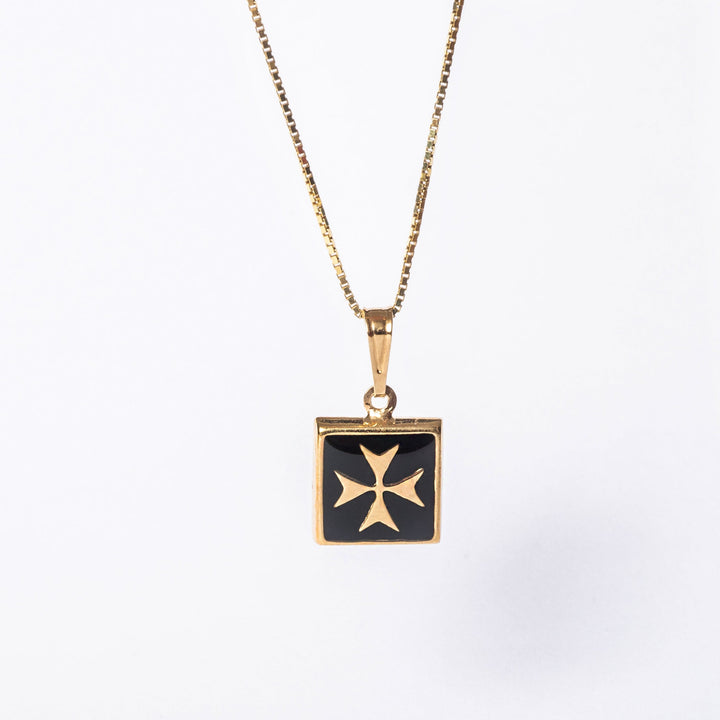 a close up view of Gianni Gold pendant standing in the center of the image surrounded by a white background. 