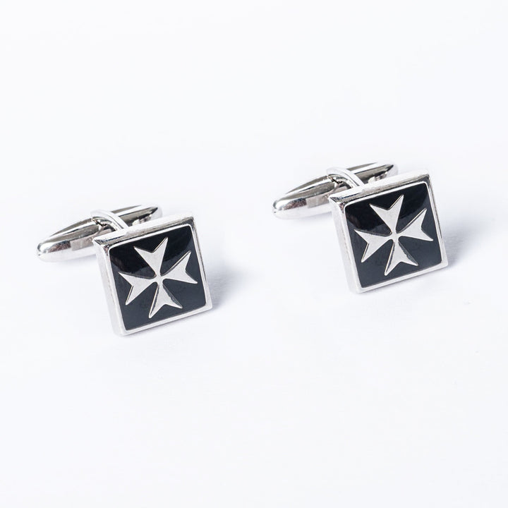 Side by side view of Gianni Silver cufflinks standing next to each other. 