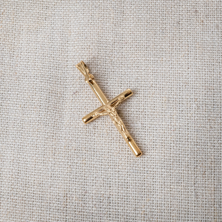 A close up view of Holy Cross Gold Pendant