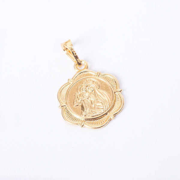 A gold-colored Holy medal pendant featuring a religious medal design, with a circular frame and an intricate central figure.
