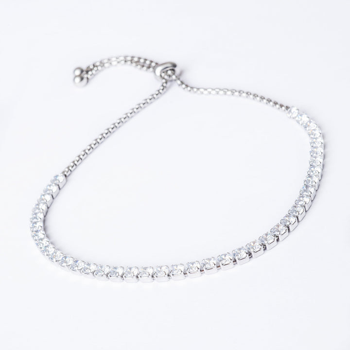 close up view of silver colour Il-Muftieh Necklace standing in the center of the image against a white background. 
