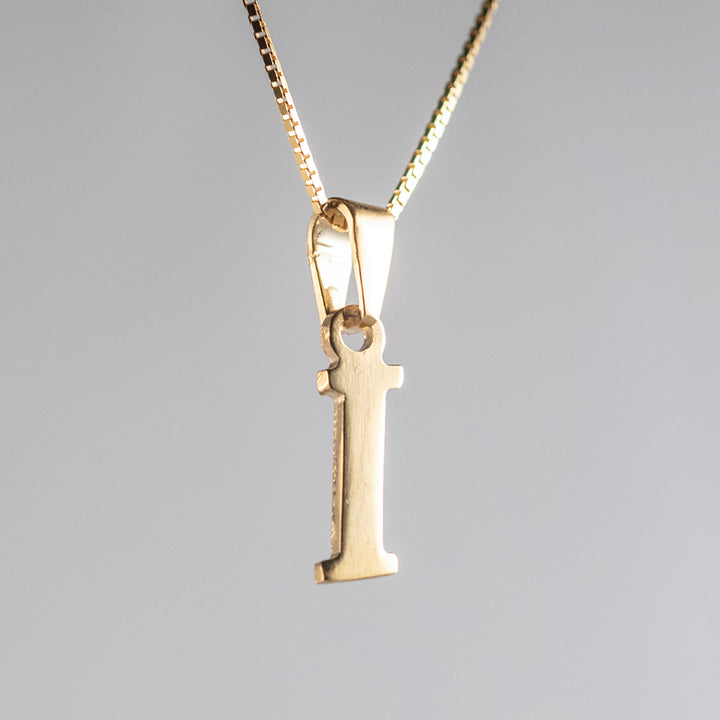 Close up view of initials gold letter pendant I  letter 