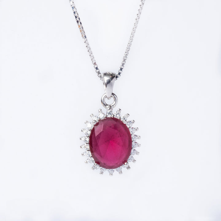 A close up view of Kate Necklace in pink stone, standing in the center of the image against a white background,. 