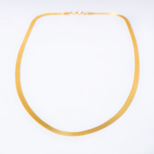 A yellow gold-plated stainless steel necklace with a textured pattern, displayed against a white background.