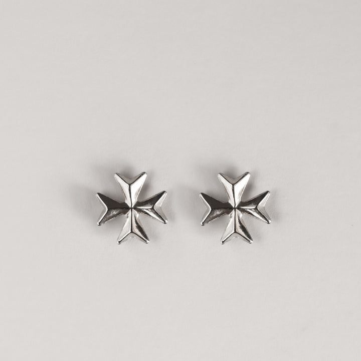 A pair of silver embossed stud  Malta cross earrings in the shape of a Maltese cross.
