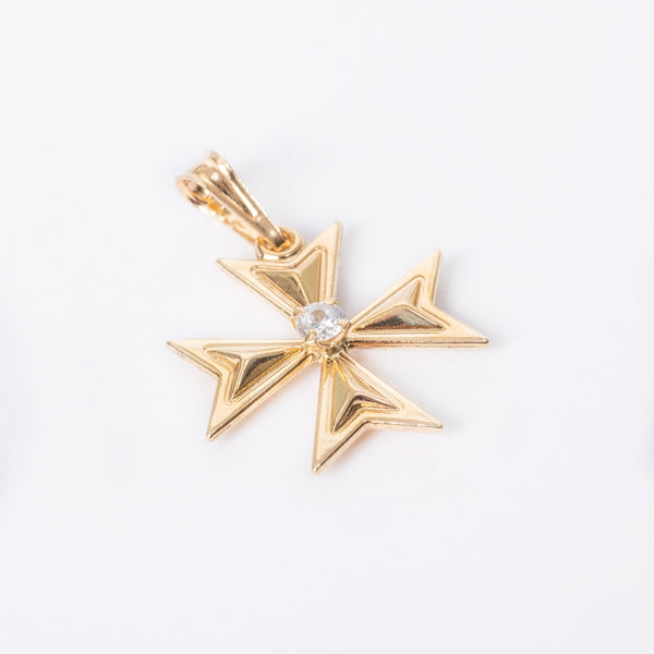 A gold-colored 18ct zircon Malta cross pendant with a six-prong setting, resembling a star or a Maltese cross, against a white background.