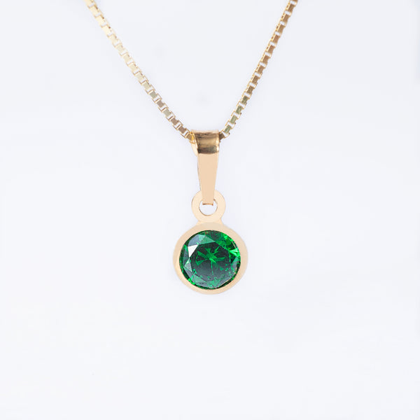 A yellow gold-plated silver May Birth Stone pendant featuring an emerald green gemstone, attached to a gold-plated chain.