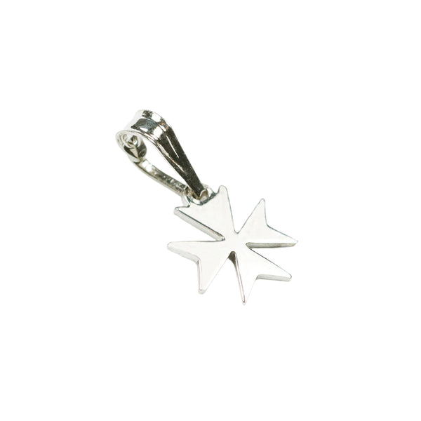 Silver star-shaped pendant on a white background