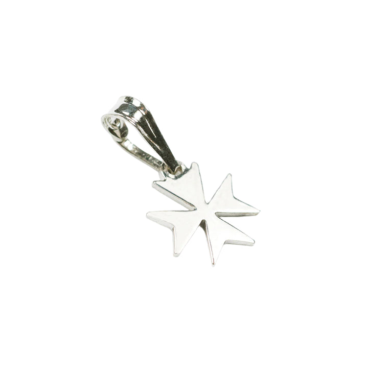 Silver star-shaped pendant on a white background