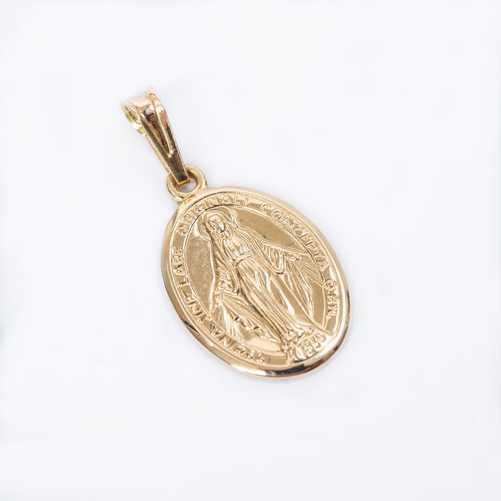 A close up view of Mirakoluza Pendant standing in the center of the image against a white background. 