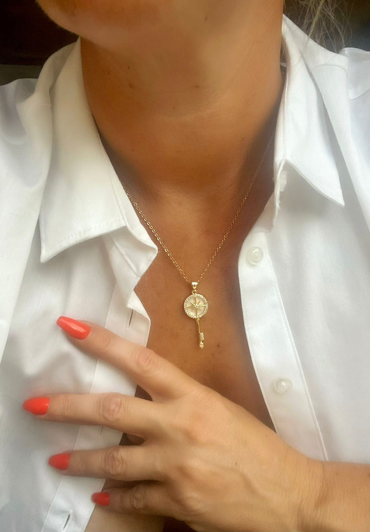A woman wearing Il-Muftieh Necklace 