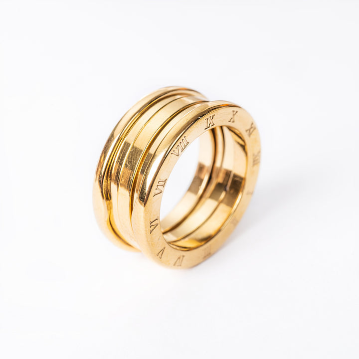 A side view of Omnia Gold standing in the center of the image against a white background. 