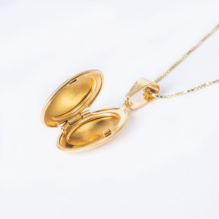 a close up view of half open Oval Locket. 