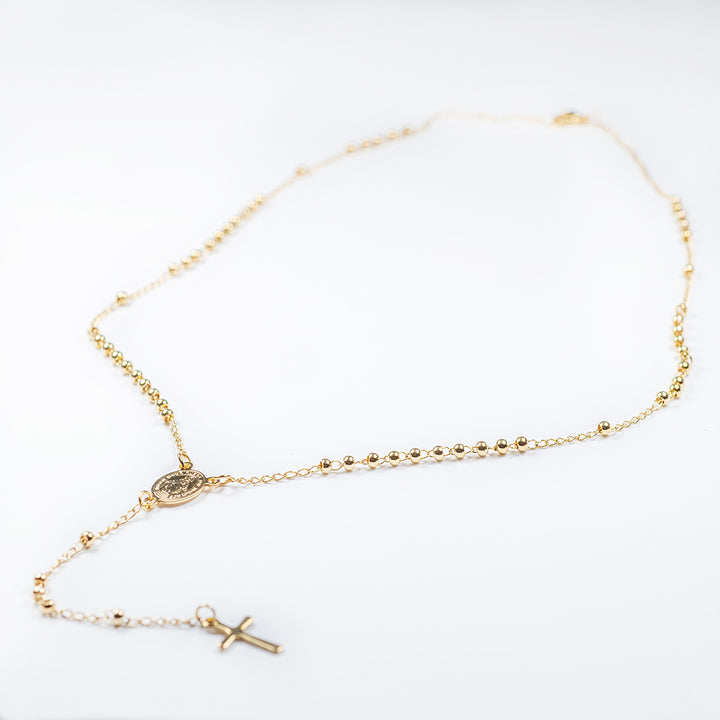 A bird view of Rosary Beads standing in the center of the image against a white background. 