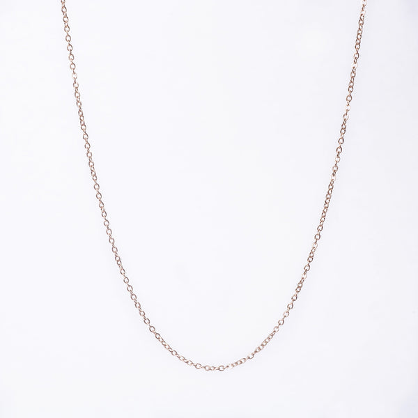 A close up view of Rose Gold Chain standing in the center of the image against a white background. 