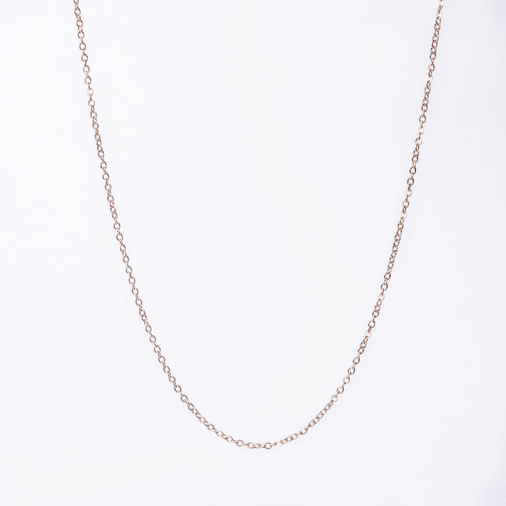 A close up view of Rose Gold Chain standing in the center of the image against a white background. 