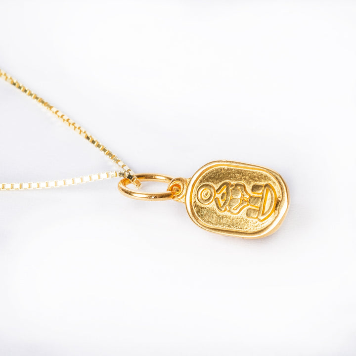 A back ( rare ) view of Scarab Necklace standing in the center of the image against a white background. 