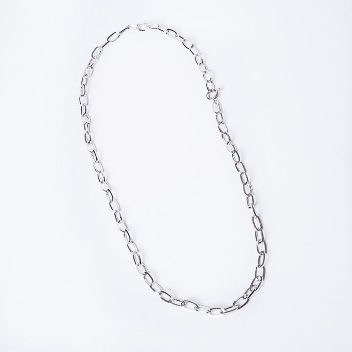 A bird view of Stef Necklace standing in the center of the image against a white background. 