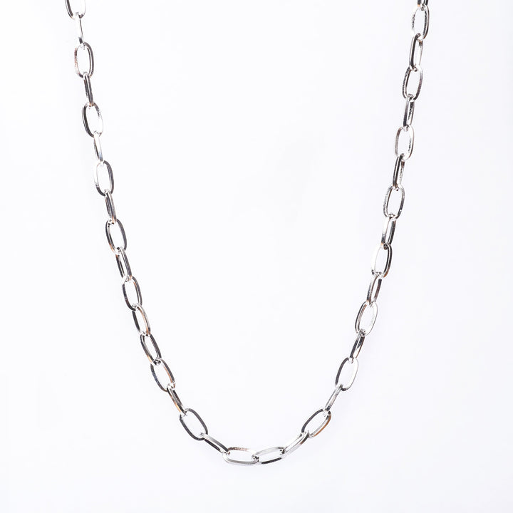 A silver stainless steel chain necklace with a gold plated finish, displayed against a white background.